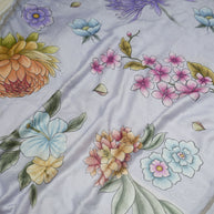 Grey pure cotton digital prints sarees with allover floral prints and zari woven border