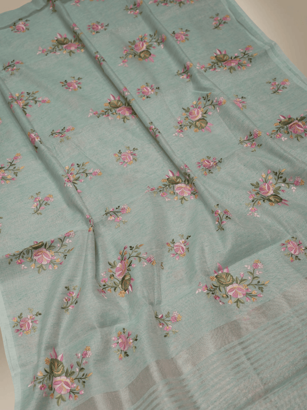 Light Firozi Colour Lenin Cotton Fancy Embroidery designs with tissue blouse
